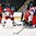 GRAND FORKS, NORTH DAKOTA - APRIL 16: Canada's Evan Fitzpatrick #1 makes a blocker save while teammate Logan Stanley #20 along with the Czech Republic's Radovan Pavlik #25 and Filip Zadina #24 looks on during preliminary round action at the 2016 IIHF Ice Hockey U18 World Championship. (Photo by Minas Panagiotakis/HHOF-IIHF Images)

